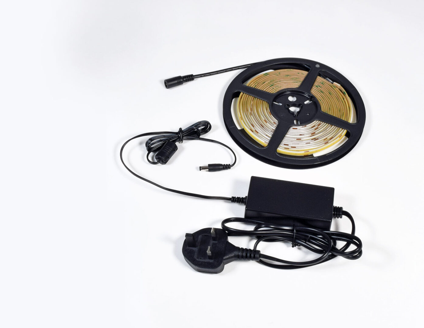 GHS special projects LED spotless tape image... 10.5W/m LED 24V 5m Spotless Ribbon Tape Kit IP20 including driver - Image 1